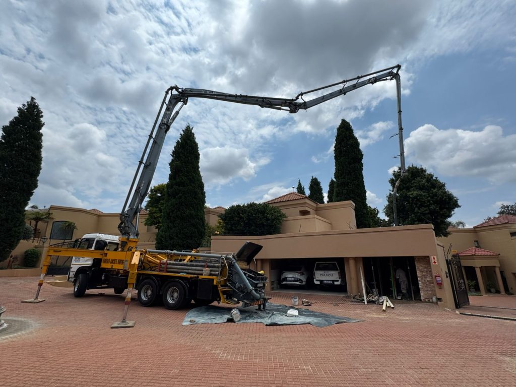 Ready Mix Concrete pumped for slab roof at morning side by the best Johannesburg construction Company
