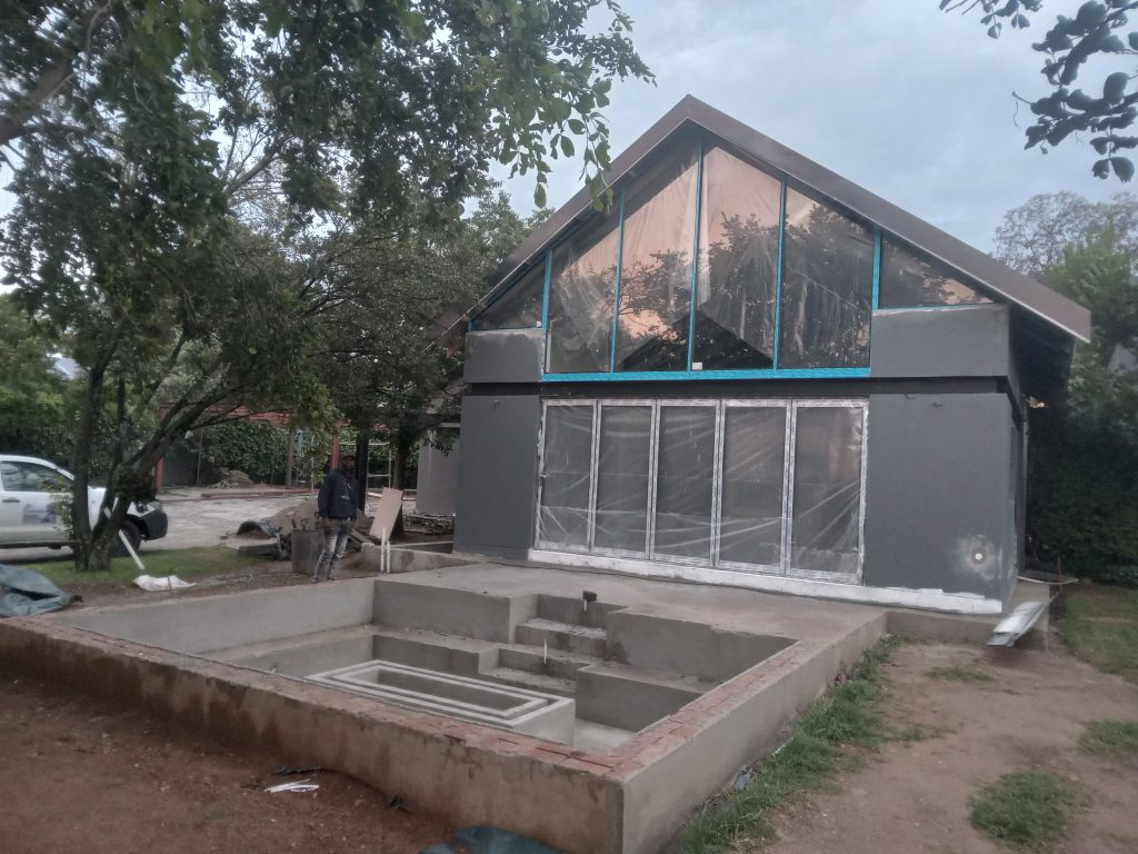 House extension with chromadec roof, 1.2m deep fish pond with steel reinforced concrete in Kyalami, Johannesburg